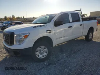 2017 Nissan Titan z VIN 1N6AA1F10HN501280, wystawiony jako Copart lot #81840124 z przebiegiem 217 906 mil mil oraz Czysty tytuł • Clean title. Historia ofert i sprzedaży dostępna na DreamBid. Obrazek 1.