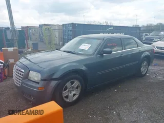 2005 Chrysler 300 with VIN 2C3AA53G55H186617, listed as a IAAI auction lot 42004943 with 230,956 mi miles. Bid and sale history available at carsss.com. Image 2.