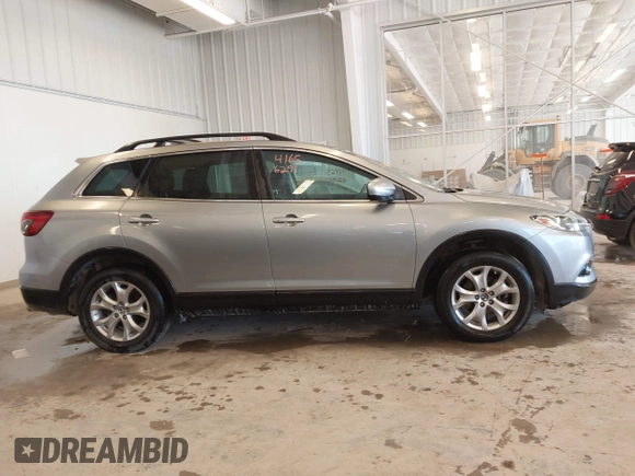 2015 Mazda CX-9 Touring with VIN JM3TB3CV5F0464675, listed as a IAAI auction lot 41656291 with 127,033 mi miles. Bid and sale history available at carsss.com. Image 14.