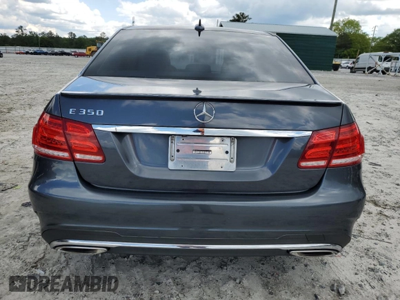 2014 Mercedes-Benz E 350 Sport with VIN WDDHF5KB9EA825975, listed as a Copart auction lot 55427505 with 134,668 mi miles and Salvage title. Bid and sale history available at DreamBid. Image 6.