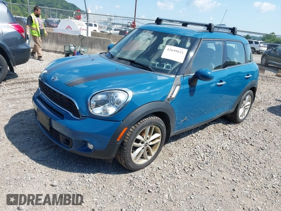 2011 MINI Countryman S with VIN WMWZC5C57BWM11279, listed as a IAAI auction lot 42649621 with 100,000 mi miles and . Bid and sale history available at DreamBid. Image 2.