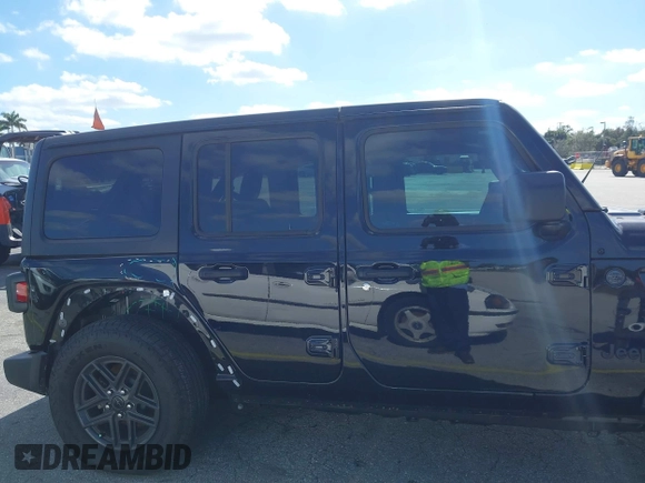 2024 Jeep Wrangler Sport S with VIN 1C4PJXDG7RW325735, listed as a IAAI auction lot 41309348 with 3,577 mi miles and . Bid and sale history available at DreamBid. Image 14.