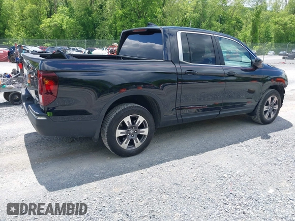 2017 Honda Ridgeline RTL with VIN 5FPYK3F51HB013989, listed as a IAAI auction lot 42206513 with 146,124 mi miles and . Bid and sale history available at DreamBid. Image 4.