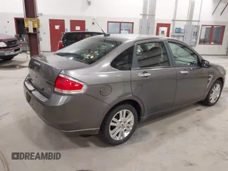2009 Ford Focus SEL with VIN 1FAHP37N39W253086, listed as a IAAI auction lot 41825983 with 158,720 mi miles. Bid and sale history available at carsss.com. Image 4.