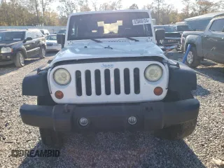 2010 Jeep Wrangler Rubicon with VIN 1J4BA6D17AL132002, listed as a Copart auction lot 83869124 with 183,507 mi miles and Salvage title. Bid and sale history available at DreamBid. Image 5.
