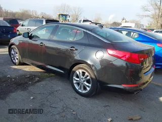 2013 Kia Optima EX z VIN 5XXGN4A77DG097074, wystawiony jako IAAI lot #41874312 z przebiegiem 81 591 mil mil oraz . Historia ofert i sprzedaży dostępna na DreamBid. Obrazek 3.