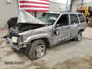 1998 Jeep Grand Cherokee Laredo с VIN 1J4GZ58Y0WC365226, выставлен на аукционе Copart как лот 56352795 с пробегом Не указан миль и Чистый • Clean title. История ставок и продаж доступна на DreamBid. Изображение 1.