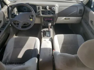 2000 Mitsubishi Montero LS z VIN JA4LS31H4YP020357, wystawiony jako Copart lot #75455764 z przebiegiem 166 952 mil mil oraz Szkody całkowita. Historia ofert i sprzedaży dostępna na DreamBid. Obrazek 8.