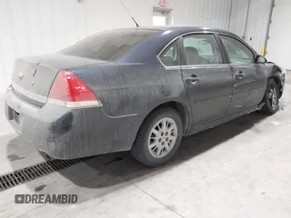 2011 Chevrolet Impala Police Police with VIN 2G1WD5EM2B1165829, listed as a IAAI auction lot 41380558 with 110,695 mi miles. Bid and sale history available at carsss.com. Image 4.