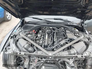 2023 BMW M4 Competition xDrive with VIN WBS43AZ04PCL58351, listed as a IAAI auction lot 41307049 with 33,207 mi miles. Bid and sale history available at carsss.com. Image 10.