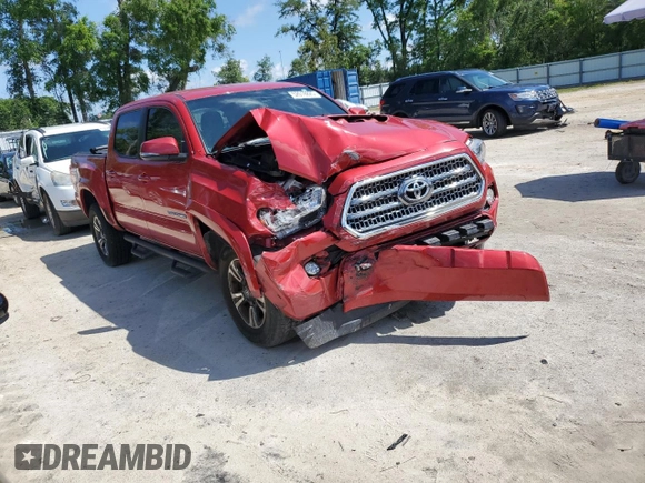 2017 Toyota Tacoma SR5 with VIN 5TFAZ5CN5HX051995, listed as a Copart auction lot 52018825 with 96,963 mi miles and Salvage Title. Bid and sale history available at DreamBid. Image 4.
