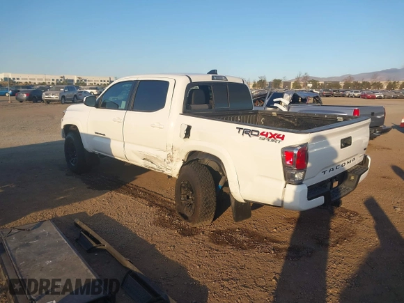 2023 Toyota Tacoma 4WD SR with VIN 3TMCZ5AN8PM647845, listed as a IAAI auction lot 41371634 with 21,917 mi miles. Bid and sale history available at carsss.com. Image 3.