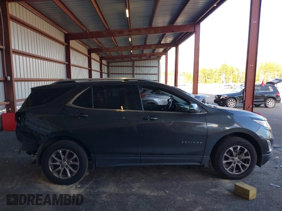 2018 Chevrolet Equinox LT with VIN 2GNAXSEV7J6263151, listed as a IAAI auction lot 40644330 with 136,428 mi miles. Bid and sale history available at carsss.com. Image 14.