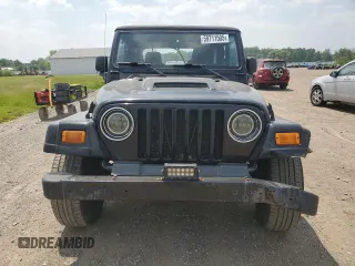 2005 Jeep Wrangler X z VIN 1J4FA39S75P321328, wystawiony jako Copart lot #59711505 z przebiegiem 126 768 mil mil oraz Szkoda całkowita • Salvage title. Historia ofert i sprzedaży dostępna na DreamBid. Obrazek 5.