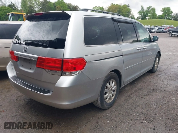 2010 Honda Odyssey EX with VIN 5FNRL3H48AB017784, listed as a IAAI auction lot 42096852 with 126,138 mi miles. Bid and sale history available at carsss.com. Image 4.