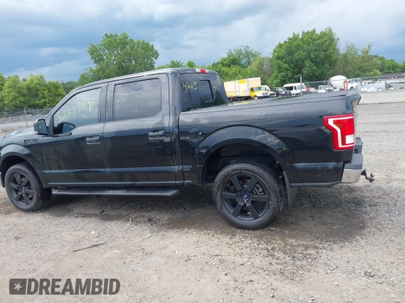 2015 Ford F-150 XLT z VIN 1FTEW1EF0FFA73964, wystawiony jako IAAI lot #42653691 z przebiegiem 129 866 mil mil oraz . Historia ofert i sprzedaży dostępna na DreamBid. Obrazek 14.