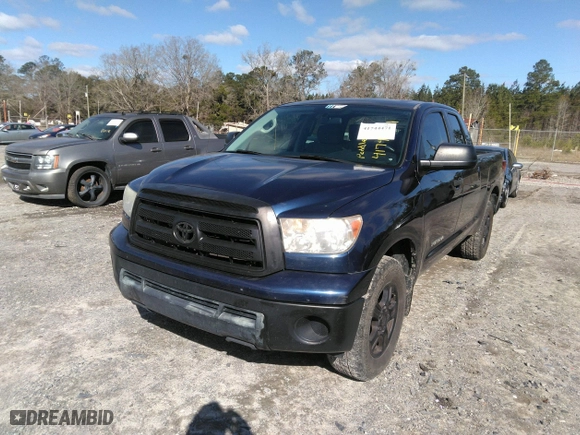 2012 Toyota Tundra 2WD Truck with VIN 5TFRM5F11CX041032, listed as a IAAI auction lot 41744471 with 207,330 mi miles. Bid and sale history available at carsss.com. Image 17.