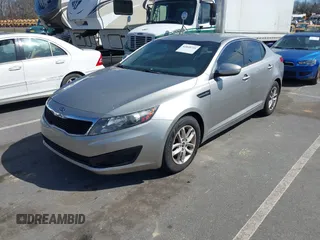 2011 Kia Optima LX with VIN KNAGM4A70B5081042, listed as a IAAI auction lot 41835721 with 203,609 mi miles and . Bid and sale history available at carsss.com. Image 2.