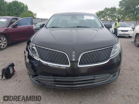 2013 Lincoln MKS z VIN 1LNHL9EK0DG600129, wystawiony jako IAAI lot #42314913 z przebiegiem 119 674 mil mil oraz . Historia ofert i sprzedaży dostępna na DreamBid. Obrazek 13.