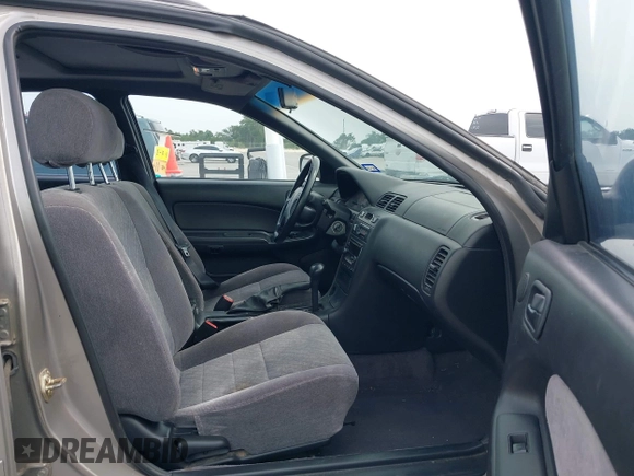 1999 Nissan Maxima GXE with VIN JN1CA21D6XT223369, listed as a IAAI auction lot 42141361 with 210,781 mi miles and . Bid and sale history available at DreamBid. Image 5.