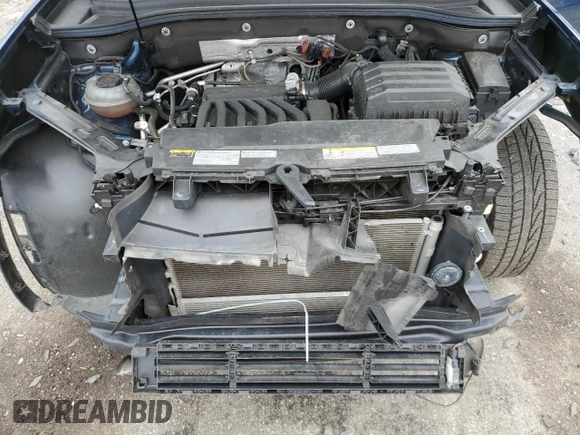 2021 Volkswagen Atlas SEL with VIN 1V2BR2CA8MC576209, listed as a Copart auction lot 57520615 with 63,575 mi miles and Salvage title. Bid and sale history available at DreamBid. Image 12.