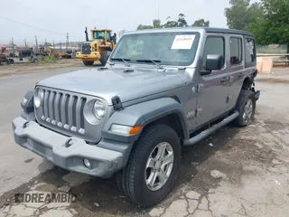 2018 Jeep Wrangler Unlimited Sport S with VIN 1C4HJXDN5JW145340, listed as a IAAI auction lot 42420695 with 92,500 mi miles and . Bid and sale history available at DreamBid. Image 17.