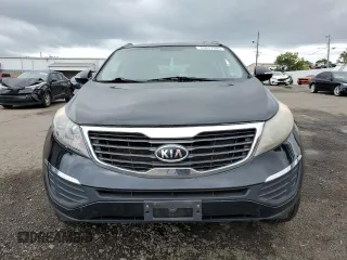 2011 Kia Sportage LX with VIN KNDPBCA24B7012852, listed as a Copart auction lot 63837085 with 186,805 mi miles and Salvage title. Bid and sale history available at DreamBid. Image 5.