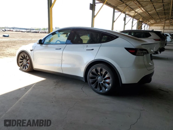2022 Tesla Model Y Performance z VIN 7SAYGDEF0NF337959, wystawiony jako Copart lot #56871985 z przebiegiem 54 527 mil mil oraz Szkoda całkowita • Salvage title. Historia ofert i sprzedaży dostępna na DreamBid. Obrazek 2.