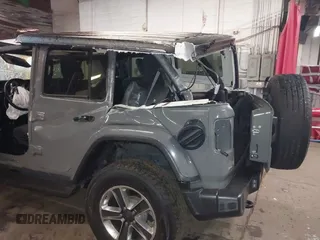 2022 Jeep Wrangler Unlimited Sahara with VIN 1C4HJXENXNW251089, listed as a IAAI auction lot 41728817 with 48,438 mi miles and . Bid and sale history available at DreamBid. Image 6.