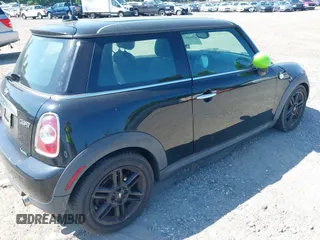 2013 MINI Hardtop with VIN WMWSU3C54DT689273, listed as a IAAI auction lot 42501517 with 100,194 mi miles and . Bid and sale history available at DreamBid. Image 4.