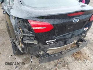 2018 Ford Focus SE with VIN 1FADP3F2XJL206441, listed as a IAAI auction lot 42341641 with 189,260 mi miles and . Bid and sale history available at DreamBid. Image 20.