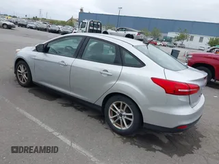2015 Ford Focus SE z VIN 1FADP3F21FL218369, wystawiony jako IAAI lot #42126986 z przebiegiem 99 844 mil mil oraz . Historia ofert i sprzedaży dostępna na DreamBid. Obrazek 3.