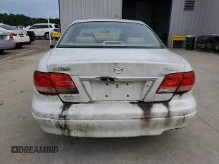 2001 Mazda Millenia z VIN JM1TA221911717066, wystawiony jako Copart lot #63341244 z przebiegiem 234 263 mil mil oraz Szkoda całkowita • Salvage title. Historia ofert i sprzedaży dostępna na DreamBid. Obrazek 6.