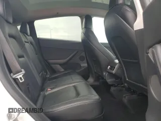 2021 Tesla Model Y Long Range z VIN 5YJYGDEE9MF200411, wystawiony jako Copart lot #53738075 z przebiegiem 97 546 mil mil oraz Szkoda całkowita • Salvage title. Historia ofert i sprzedaży dostępna na DreamBid. Obrazek 11.