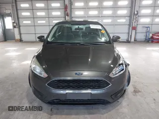2017 Ford Focus SE with VIN 1FADP3F29HL220440, listed as a IAAI auction lot 41975013 with 40,295 mi miles and . Bid and sale history available at DreamBid. Image 12.