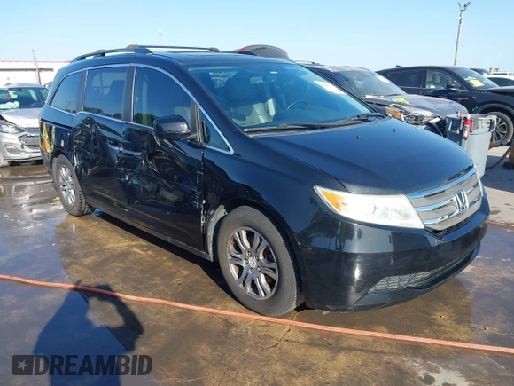 2013 Honda Odyssey EX-L with VIN 5FNRL5H6XDB090768, listed as a IAAI auction lot 42008759 with 116,052 mi miles and . Bid and sale history available at carsss.com. Image 1.