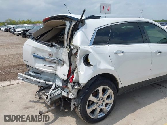 2012 Cadillac SRX Premium Collection с VIN 3GYFNCE36CS557597, выставлен на аукционе IAAI как лот 42115362 с пробегом 122 434 миль миль и . История ставок и продаж доступна на DreamBid. Изображение 6.