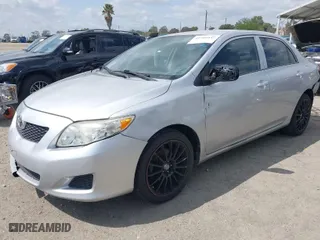 2010 Toyota Corolla with VIN 1NXBU4EE2AZ185716, listed as a IAAI auction lot 41909937 with 158,459 mi miles. Bid and sale history available at carsss.com. Image 2.