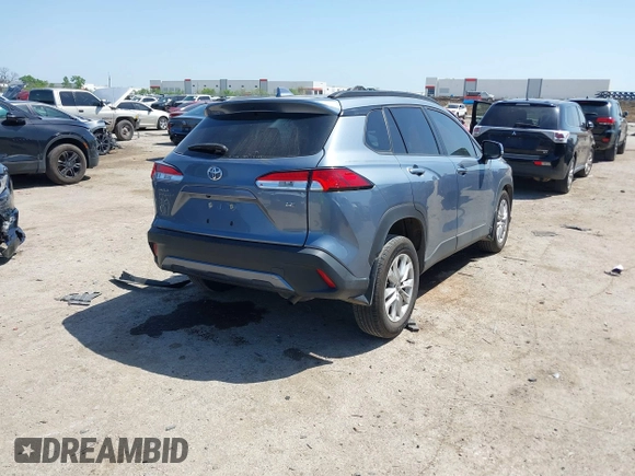2023 Toyota Corolla Cross LE with VIN 7MUCAAAGXPV045651, listed as a IAAI auction lot 42006289 with 23,282 mi miles and . Bid and sale history available at DreamBid. Image 4.