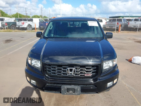 2013 Honda Ridgeline Sport with VIN 5FPYK1F70DB011814, listed as a IAAI auction lot 41689579 with 136,251 mi miles and . Bid and sale history available at DreamBid. Image 12.
