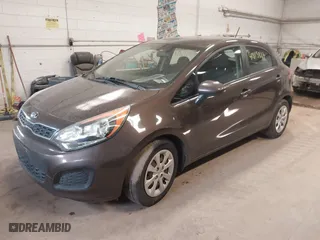 2013 Kia Rio SX with VIN KNADN5A32D6136879, listed as a IAAI auction lot 41815817 with 110,763 mi miles. Bid and sale history available at carsss.com. Image 2.