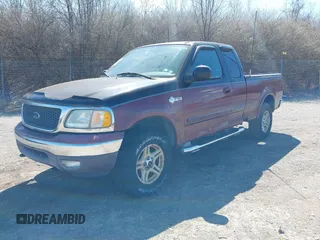 2003 Ford F-150 XL with VIN 1FTRX18L93NB24606, listed as a IAAI auction lot 41888993 with 1 mi miles. Bid and sale history available at carsss.com. Image 2.