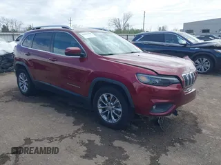 2019 Jeep Cherokee Latitude Plus z VIN 1C4PJLLB3KD128982, wystawiony jako IAAI lot #41855198 z przebiegiem 390 522 mil mil oraz . Historia ofert i sprzedaży dostępna na DreamBid. Obrazek 1.