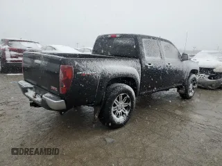 2011 GMC Canyon SLE1 with VIN 1GTH6MFE6B8141218, listed as a Copart auction lot 81897704 with 233,039 mi miles and Salvage Title. Bid and sale history available at carsss.com. Image 3.