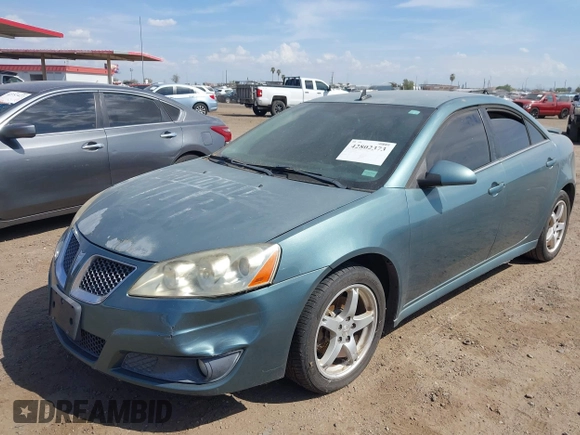 2009 Pontiac G6 1SB with VIN 1G2ZJ57K594261692, listed as a IAAI auction lot 42802373 with 200,469 mi miles and . Bid and sale history available at DreamBid. Image 6.