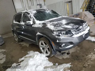 2016 Volkswagen Tiguan R-Line with VIN WVGAV7AX0GW614575, listed as a Copart auction lot 45099785 with 154,456 mi miles and Salvage Title. Bid and sale history available at carsss.com. Image 4.