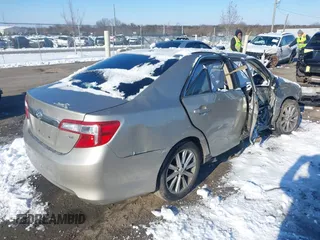 2014 Toyota Camry SE with VIN 4T1BK1FK6EU026342, listed as a IAAI auction lot 41246628 with 142,586 mi miles. Bid and sale history available at carsss.com. Image 4.