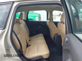 2018 Ford Escape S z VIN 1FMCU0F76JUA99595, wystawiony jako IAAI lot #42369434 z przebiegiem 19 207 mil mil oraz . Historia ofert i sprzedaży dostępna na DreamBid. Obrazek 8.