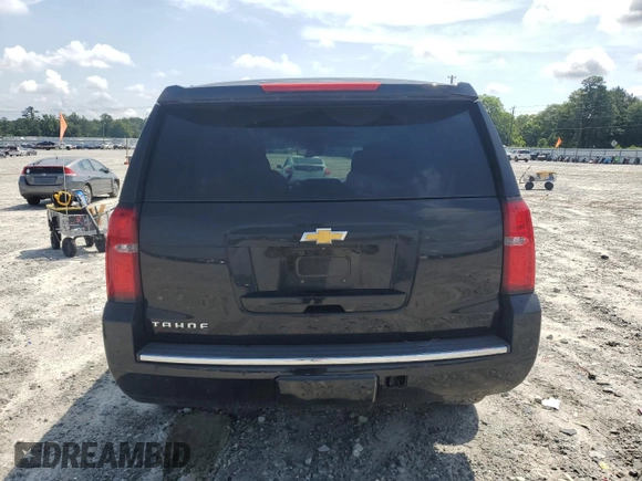 2015 Chevrolet Tahoe LTZ with VIN 1GNSCCKC2FR693500, listed as a Copart auction lot 60225195 with 206,210 mi miles and Salvage title. Bid and sale history available at DreamBid. Image 6.