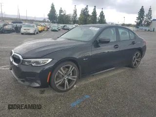 2022 BMW 3 Series 330e with VIN 3MW5P7J06N8C30953, listed as a Copart auction lot 48010515 with 46,941 mi miles and Salvage Title. Bid and sale history available at carsss.com. Image 1.